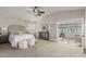 Bright bedroom with plush carpeting, neutral color palette, and sitting area at 15237 S 19Th Way, Phoenix, AZ 85048