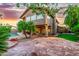 This beautiful home boasts a large pool, patio, palm trees, and well-manicured landscaping at 15237 S 19Th Way, Phoenix, AZ 85048