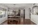 Bright kitchen and dining area featuring dark brown cabinets and natural light at 15237 S 19Th Way, Phoenix, AZ 85048