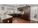 Modern kitchen with granite counters, stainless steel appliances and warm wood cabinets at 15237 S 19Th Way, Phoenix, AZ 85048