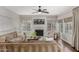 Cozy living room with neutral colors, a fireplace, and ample natural light at 15237 S 19Th Way, Phoenix, AZ 85048