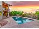Expansive pool area with lush desert landscaping creating a private and serene outdoor space at 15237 S 19Th Way, Phoenix, AZ 85048