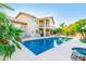 Inviting backyard with a sparkling pool, patio, and mature palm trees, perfect for relaxing at 15237 S 19Th Way, Phoenix, AZ 85048