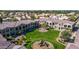 Attractive condo community boasts lush green space and a playground for outdoor enjoyment at 155 N Lakeview Blvd # 268, Chandler, AZ 85225