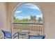 Balcony with patio furniture and views of landscaping and distant streets at 155 N Lakeview Blvd # 268, Chandler, AZ 85225