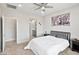 Spacious bedroom with neutral tones, ceiling fan and comfortable bedding at 155 N Lakeview Blvd # 268, Chandler, AZ 85225