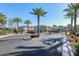Gated community entrance surrounded by palm trees and manicured landscaping offers privacy and security at 155 N Lakeview Blvd # 268, Chandler, AZ 85225