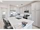 Well-lit kitchen with stainless steel appliances, grey cabinets, and countertops at 155 N Lakeview Blvd # 268, Chandler, AZ 85225