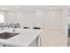Bright kitchen featuring stainless steel sink, modern faucet and white countertop at 155 N Lakeview Blvd # 268, Chandler, AZ 85225