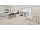 Open floor plan with modern kitchen and living area at 155 N Lakeview Blvd # 268, Chandler, AZ 85225