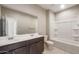 Bathroom with double sink vanity and modern fixtures at 16689 W Whispering Wind Dr, Surprise, AZ 85387