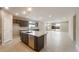 Spacious kitchen featuring a large island, modern appliances, and ample cabinet space for storage at 16689 W Whispering Wind Dr, Surprise, AZ 85387