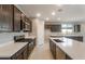 Well-appointed kitchen with stainless steel appliances, a gas range, and modern cabinetry at 16689 W Whispering Wind Dr, Surprise, AZ 85387