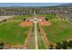 Overhead view of a community park featuring well-maintained baseball and soccer fields at 17235 W Statler St, Surprise, AZ 85388