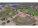 Bird's-eye view of community baseball fields, tennis courts, and running track at 17235 W Statler St, Surprise, AZ 85388