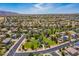 Aerial shot of a meticulously planned community featuring a central park and well-maintained homes at 17235 W Statler St, Surprise, AZ 85388