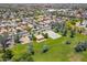 Expansive aerial view of the community park with green spaces and residential homes at 17235 W Statler St, Surprise, AZ 85388