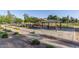 Inviting park pavilion with picnic tables, benches and lush landscaping for outdoor enjoyment at 17235 W Statler St, Surprise, AZ 85388