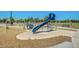 Community playground featuring modern play structures, slides, and climbing equipment at 17235 W Statler St, Surprise, AZ 85388