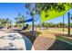 Community playground with swings and climbing structures at 17235 W Statler St, Surprise, AZ 85388