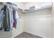 Spacious walk-in closet with shelving for linens and hanging storage at 17235 W Statler St, Surprise, AZ 85388