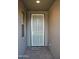 Entrance showcasing the screen door at 17427 W Hadley St, Goodyear, AZ 85338