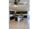 Open kitchen design with large island and stainless appliances, perfect for modern living at 17427 W Hadley St, Goodyear, AZ 85338