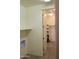 View of laundry room leading into the bedroom at 17427 W Hadley St, Goodyear, AZ 85338