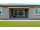 Covered patio provides a great space for relaxing outdoors with a landscaped backyard at 17427 W Hadley St, Goodyear, AZ 85338