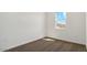 Bedroom with carpeted floor and a window with a view at 1785 W Solstice Ave, Apache Junction, AZ 85120