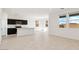 Spacious kitchen with modern black cabinets, white countertops and stainless steel appliances at 1785 W Solstice Ave, Apache Junction, AZ 85120