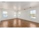 Open bonus room with multiple windows and tile flooring at 18663 W Vogel Ave, Goodyear, AZ 85338