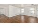 A spacious bonus room with tile flooring and natural light at 18663 W Vogel Ave, Goodyear, AZ 85338