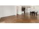 Spacious living room with tile flooring seamlessly connects to the kitchen area at 18663 W Vogel Ave, Goodyear, AZ 85338