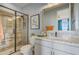 Well-appointed bathroom with granite countertops, modern fixtures, and a walk-in shower at 19426 W San Juan Ave, Litchfield Park, AZ 85340