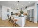 Spacious kitchen with stainless steel appliances, a center island, and ample counter space at 19426 W San Juan Ave, Litchfield Park, AZ 85340