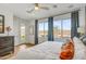 Inviting bedroom with large windows providing natural light and views of the outdoor landscaping at 19426 W San Juan Ave, Litchfield Park, AZ 85340