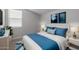 Stylish bedroom featuring a comfortable bed, modern decor, and a serene color palette for relaxation at 20073 S 231St Pl, Queen Creek, AZ 85142