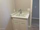 Practical laundry area featuring a built-in sink and cabinet, designed for convenience and efficiency at 20073 S 231St Pl, Queen Creek, AZ 85142
