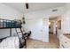 Brightly lit bedroom with a desk and storage at 20100 N 78Th Pl # 1048, Scottsdale, AZ 85255