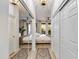 Hallway view into a main bedroom with mirrored closet doors at 20100 N 78Th Pl # 1048, Scottsdale, AZ 85255