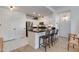 Bright kitchen with white cabinets, stainless steel appliances, and a breakfast bar at 20100 N 78Th Pl # 1048, Scottsdale, AZ 85255