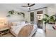 Serene main bedroom with balcony access, plush bedding, and stylish decor at 20100 N 78Th Pl # 1048, Scottsdale, AZ 85255