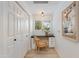 Bright office nook featuring built-in desk, natural light, and storage cabinets at 20100 N 78Th Pl # 1048, Scottsdale, AZ 85255
