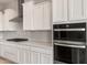 A well-equipped kitchen with oven and ample counter space at 24791 N 169Th Dr, Surprise, AZ 85387
