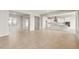 Expansive open-concept living area boasts tile flooring and neutral walls at 24791 N 169Th Dr, Surprise, AZ 85387