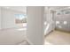 The elegant bathroom features dual sink vanities and a glass enclosed shower in a brightly lit, modern design at 24791 N 169Th Dr, Surprise, AZ 85387