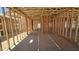 Framed interior highlights the structure of the future residence at 32101 N Lone Rancher Way, San Tan Valley, AZ 85140