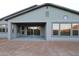 Covered patio in the backyard with sliding glass doors and ample natural light at 32541 N 135Th Dr, Peoria, AZ 85383
