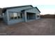 Wide angle shot of the backyard area with space for landscaping at 32541 N 135Th Dr, Peoria, AZ 85383